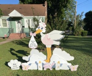 Stork Rental with Pet Paw Stork Yard Sign Rentals
